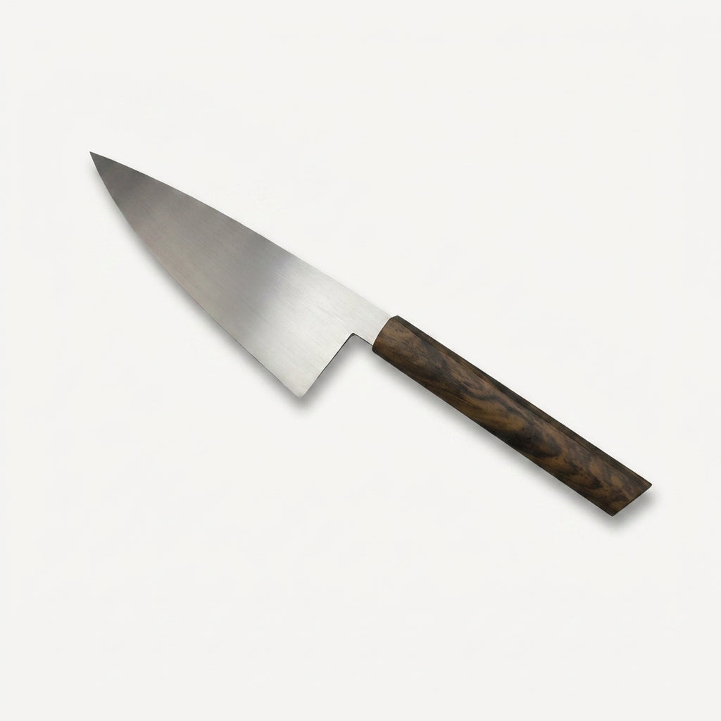 Full side profile of the HandFab MK-III handmade chef knife with western-bellied 80CRV2 carbon blade and walnut handle
