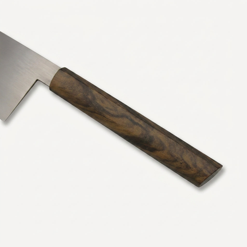 Close-up of the HandFab MK-III stabilised Turkish walnut handle showing natural grain and figuring